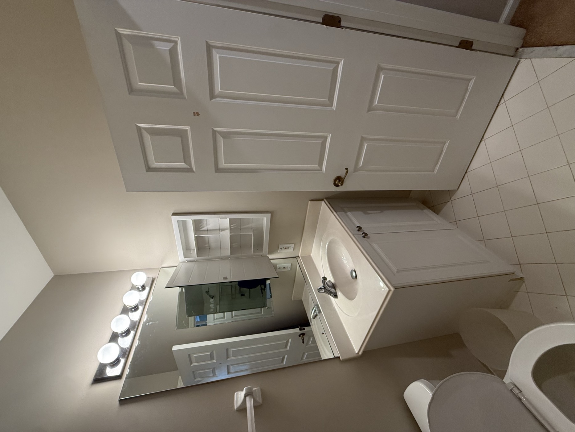 Bathroom with a vanity and a tub shower